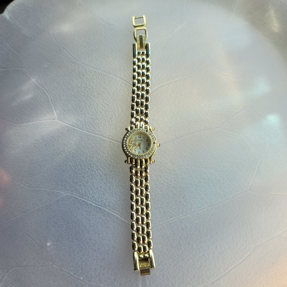 Details Womens‎ Gold Tone Crystal Bezel Quartz Watch DTL1056E Floating Crystals